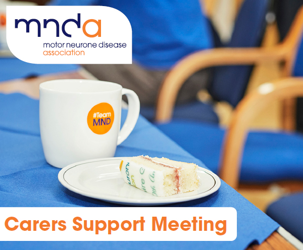 Plate with a piece of cake and a mug of tea